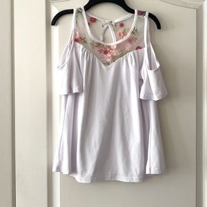 White floral blouse.